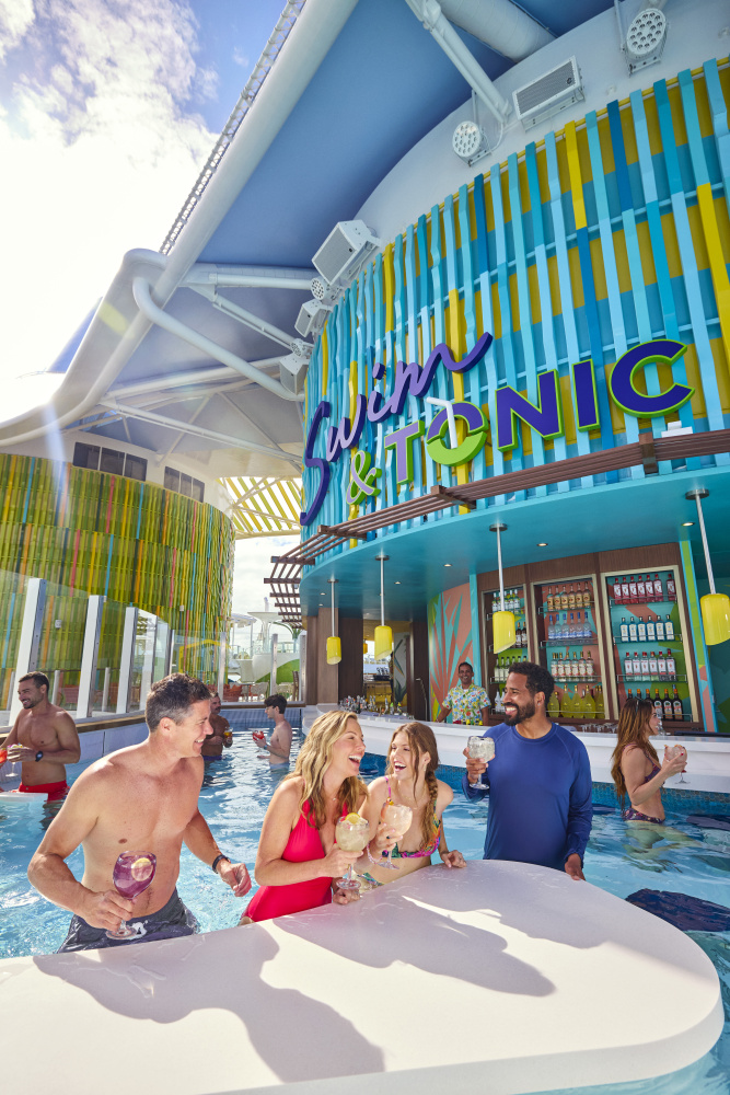 On Icon of the Seas, Swim & Tonic in Chill Island is Royal Caribbean's first swim-up bar at sea. Vacationers can have a sip while they take a dip and sit back at this vibrant spot, with in-water loungers and tables, a whirlpool and more.