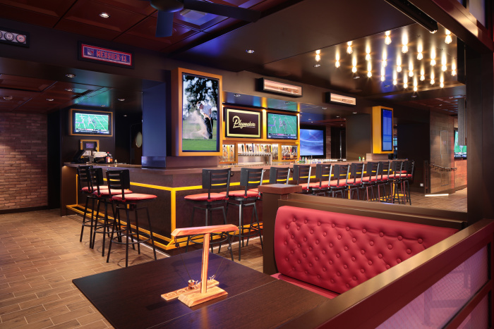  Playmakers Sports Bar & Arcade on Royal Caribbean’s Utopia of the Seas is the fan-favorite spot for adventurers to catch their favorite teams live on dozens of screens while they dig into game day snacks, ice-cold beers and drinks.